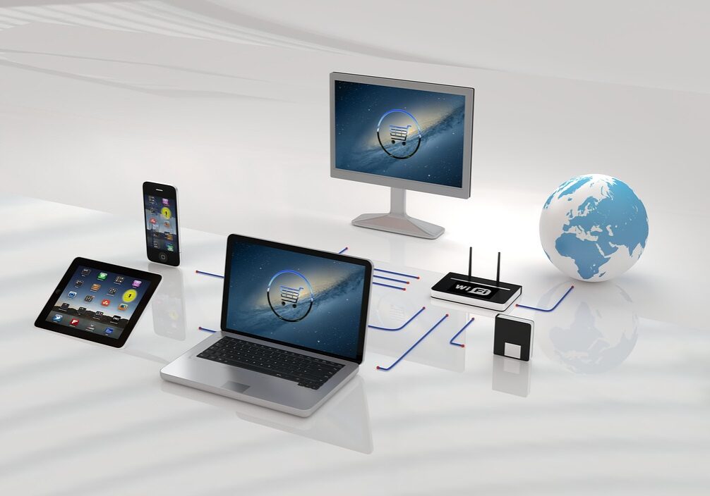 a graphic showing a website displayed on multiple different devices